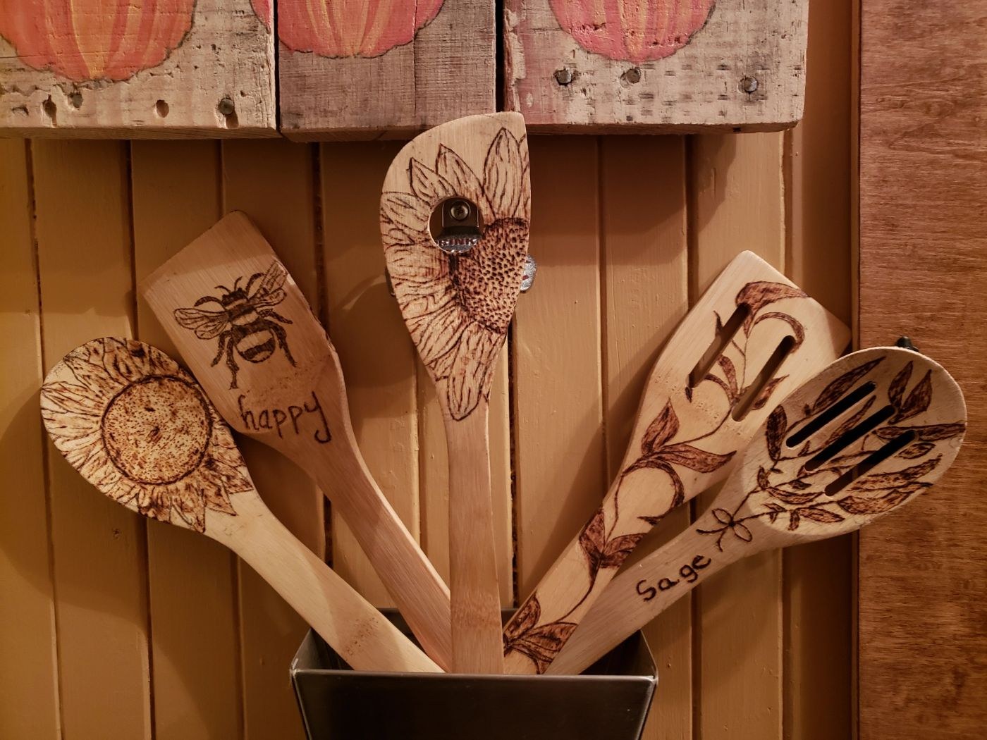 Hand-burned wooden kitchen utensils with sunflower and bee designs